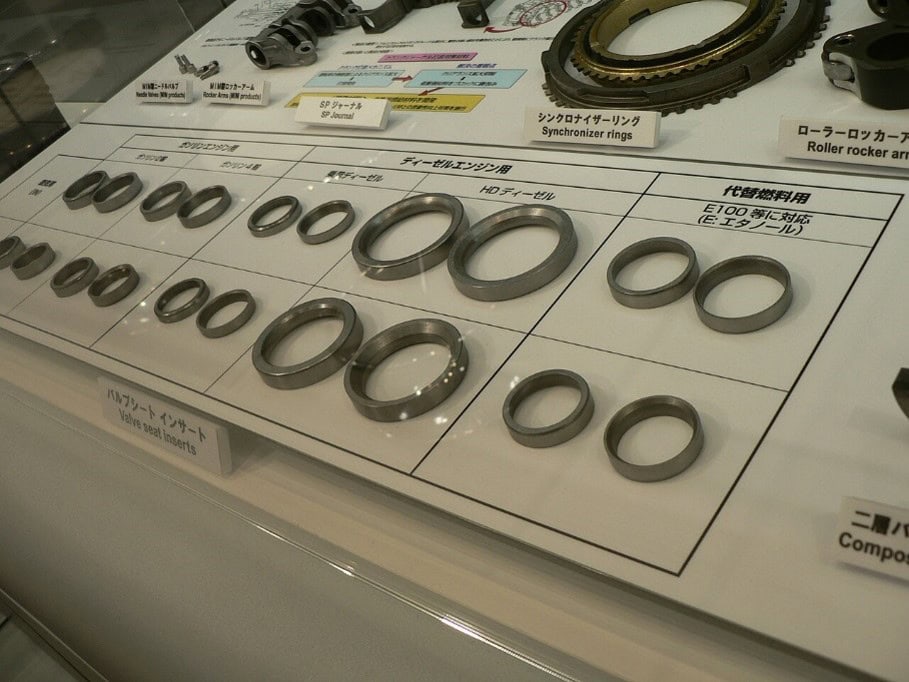 Automotive valve seat inserts in various sizes and materials, available from Masterparts.